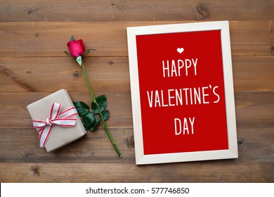 Happy Valentine's Day Card, Gift Box And Red Rose On Wood Background, Banner 