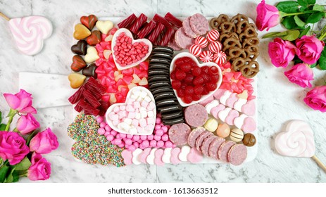 Happy Valentine's Day Flat Lay Overhead Candy And Cookies Dessert Charcuterie Grazing Platter.