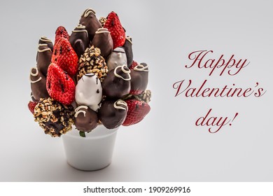 Happy Valentine's Day Greeting Card With Red Lettering; A Bunch Of Edible Flowers, Arrangement Of Chocolate Dipped Strawberries Isolated On White Background