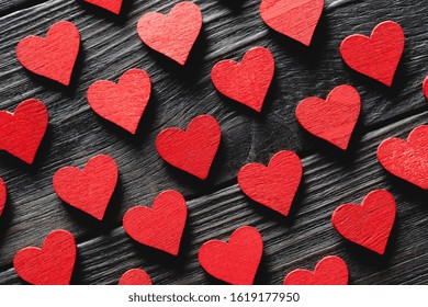 Happy Valentine's day hearts on wooden background. Love concept for mother's day and valentine's day. - Powered by Shutterstock