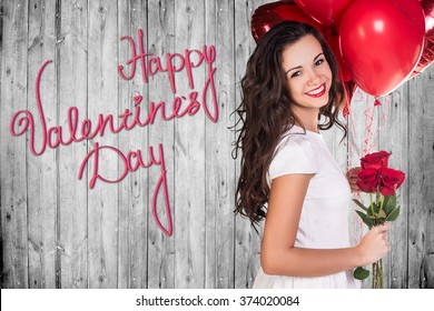 Happy Valentines Day on a gray wooden wall - Shutterstock ID 374020084