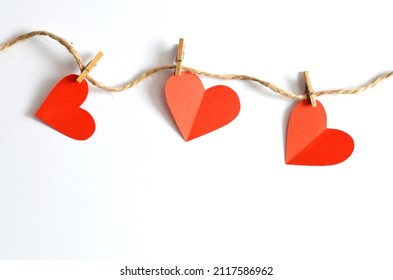 Happy valentine's day, red hearts on a white background
