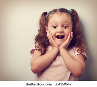 Happy Very Excited Kid Girl With Open Mouth Looking. Closeup Vintage Portrait