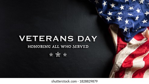 Happy Veterans Day concept. American flags against a blackboard background. November 11. - Shutterstock ID 1828829879