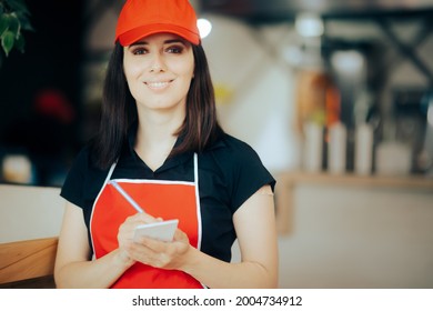 Happy Waitress Taking Food Order Working in a Restaurant. Waitress at work greeting customers ready to take their order
 - Powered by Shutterstock