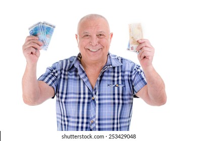 Happy Wealthy Old Guy Man, Successful People Business Man Holding Millions Euro Money Banknotes In Hands For Selling Tickets. Isolated White. Positive Human Emotion, Facial Expression Feeling Fortune.