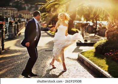 Happy Wedding Couple In Como Lake, Italy