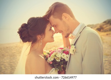 Happy Wedding Couple On Beach