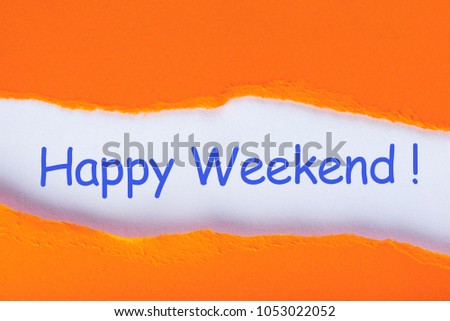 Happy Weekend - Hand writing text on a piece of paper on orange torn envelope background