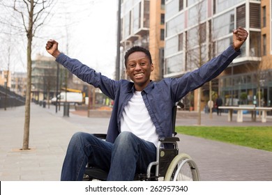 happy wheelchair user celebrating a success. 