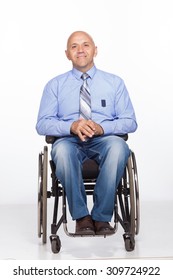 Happy Wheelchair User Isolated On White.