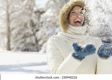 Happy winter time. Well dressed enjoying the winter - Powered by Shutterstock