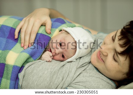 Similar – Image, Stock Photo Mother hugging her sleeping baby girl