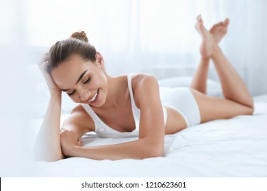 Happy Woman With Beautiful Face And Body. Beauty And Skin Care