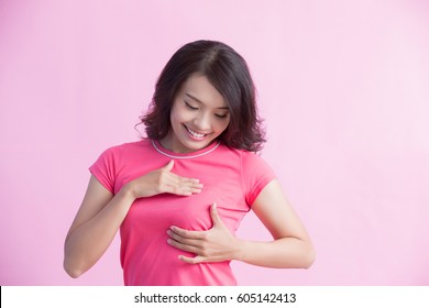 Happy Woman Check Her Chest With Pink Ribbon, Great For Prevention Breast Cancer Concept