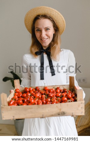 Similar – Image, Stock Photo Young smiling florist with a bouquet of ranunculus