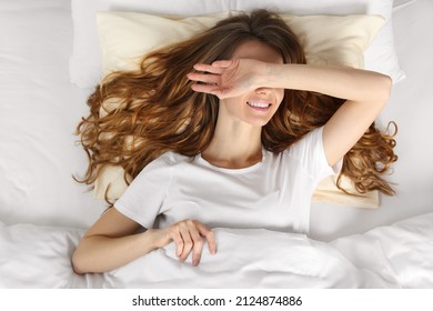 Happy Woman In Comfortable Bed, Top View