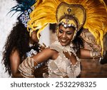 Happy, woman and dancing in carnival, samba and confident for performance, night and costume for event. Festival, stage and person with talent, smile and dancer with rhythm, party and Rio de Janeiro