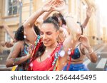 Happy woman dancing street carnival festival. Party in Brazil,Carnaval event.