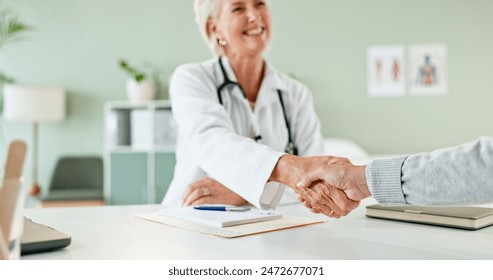 Happy woman, doctor and handshake with patient for consultation, agreement or checkup at hospital. Female person or medical professional shaking hands with client for meeting, deal or appointment - Powered by Shutterstock