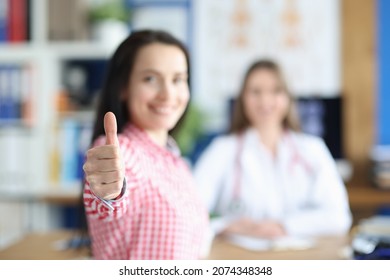 Happy Woman In The Doctor's Office Rejoices In Recovery