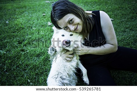 Similar – Portrait of a young, tall woman behind a blond Labrador