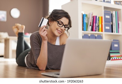 Happy Woman Doing Online Shopping At Home 