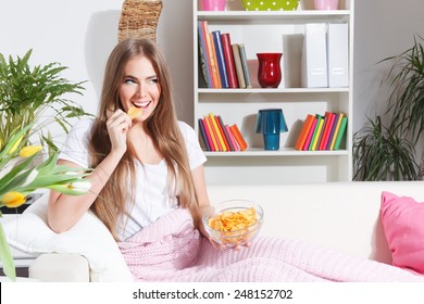 Happy Woman Eating Chips