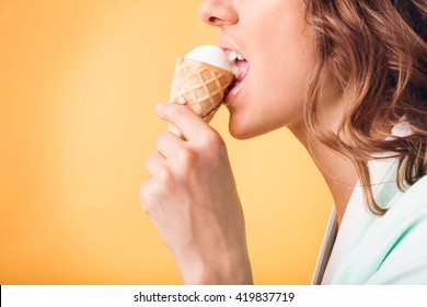
Happy woman eating ice cream