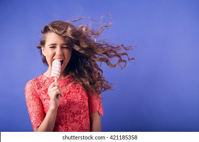 Happy Woman Eating Ice Cream