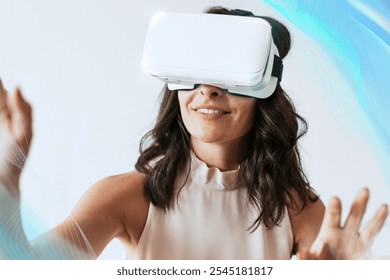 Happy woman enjoying a vr headset. Woman VR headset device, blue innovative VR technology hologram overlay, high-tech futuristic virtual reality technology concept. - Powered by Shutterstock