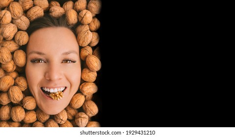 Happy Woman Face With Perfect Smile On A Walnuts Background With Black Advertisement Board For Text. Eating Nuts. Healthy Vegetarian Protein, Nutritious Food. Woman With Strong Teeth And White Smile