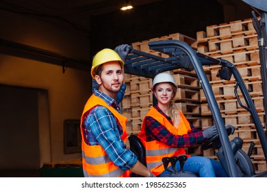 Happy Woman Forklift Driver Smiling, Looking At The Camera