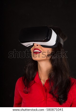 Happy woman with glasses of virtual reality. VR concept.