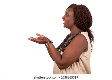 Happy Woman With Hand Gesture To Copy Space And Head Tilted Up Waiting For A Surprise