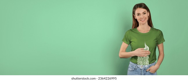 Happy woman with healthy digestive system on turquoise background, banner design with space for text. Illustration of gastrointestinal tract - Shutterstock ID 2364226995
