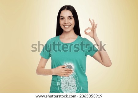 Happy woman with healthy digestive system on light yellow background. Illustration of gastrointestinal tract