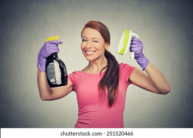 Happy Woman Holding Brush And Detergent Cleaning Solution Bottle 