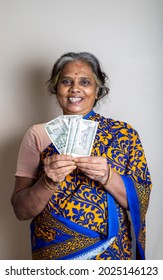 Happy Woman Holding New 500 Rupee Notes