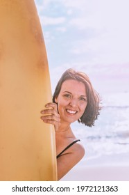 Happy Woman Holding A Surfboard Mockup