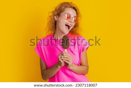 happy woman with icelolly ice cream on background. photo of woman