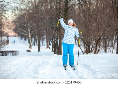 Happy Woman On Cross Ski Riding On Snow With Copyspace