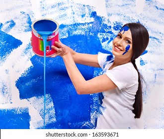 Happy Woman Paint Wall At Home.