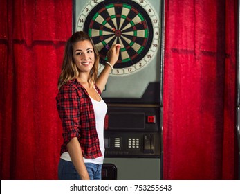 Happy Woman Playing Darts