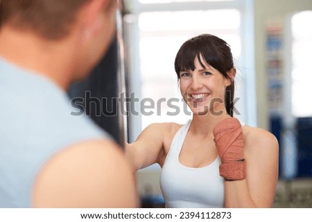 Happy woman, portrait and boxing with personal trainer for self defense, workout or exercise at gym. Face of female person or boxer smile for MMA, fighting or indoor training in martial arts practice