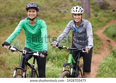 Happy woman, portrait and friends on bicycle for sports, fitness or outdoor cycling in nature. Young female person, athlete or cyclist in forest for off road workout, training or cardio exercise