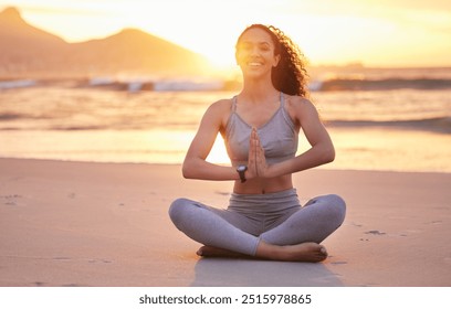 Happy woman, portrait and meditation with sunset on beach for fitness, inner peace or awareness in nature. Young, female person or yogi with smile or namaste for zen or spiritual wellness by ocean - Powered by Shutterstock