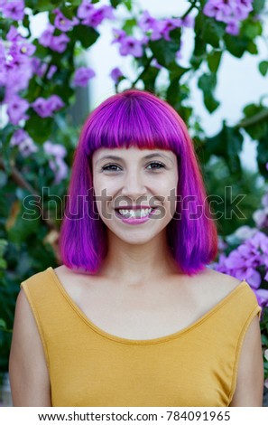 Happy woman with purple hair