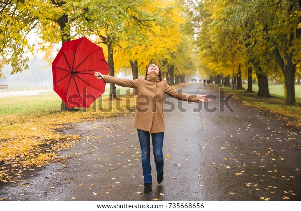 Happy Woman Red Umbrella Walking Rain Stock Photo Edit Now 735668656