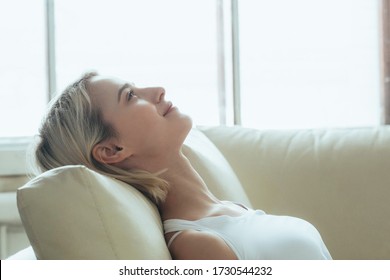 Happy woman relax home alone. Casual natural female portrait home. Studio shot. - Shutterstock ID 1730544232